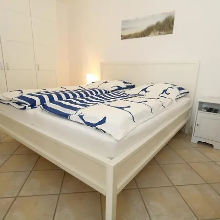 Watthaus-6-geschmackvolle-erdgeschosswohnung-mit-terrasse-und-strandkorb 公寓